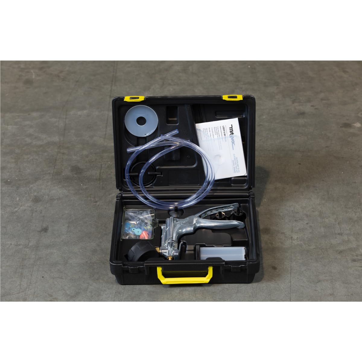 Mityvac pump held in hand illustrating compact size and ergonomic operation for comfort