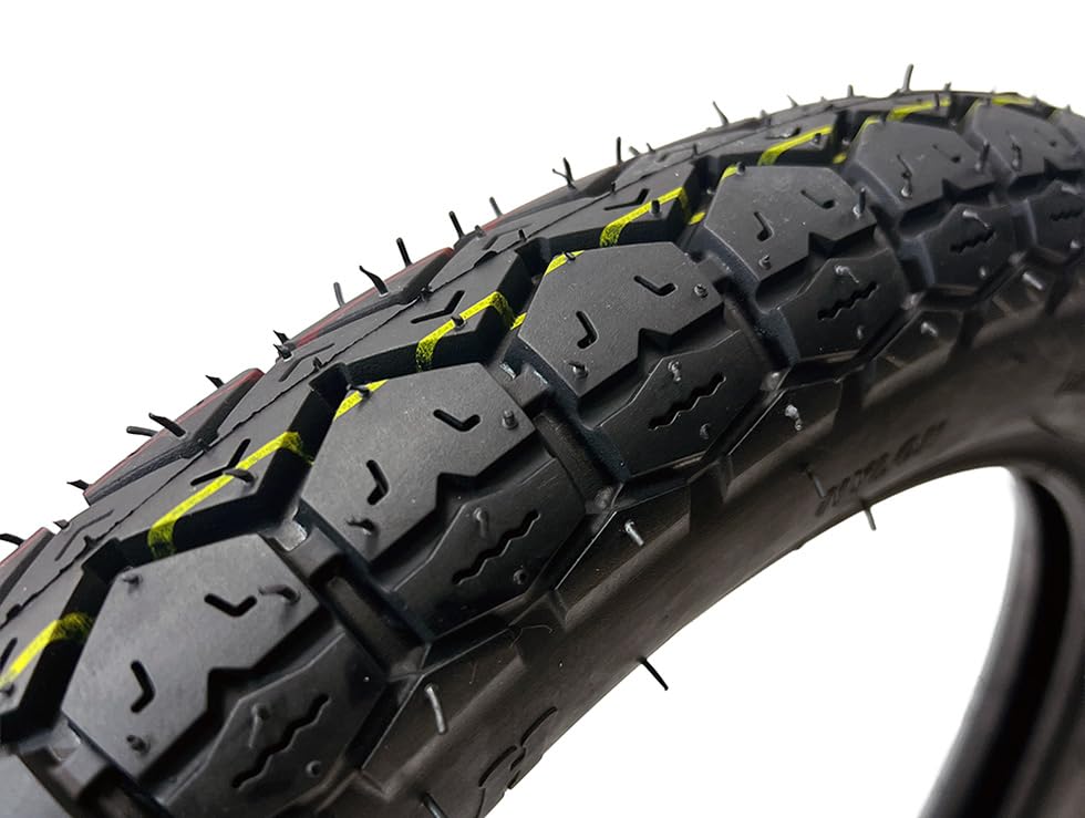 MMG front tire tread close-up showing compound and grooves for wet grip