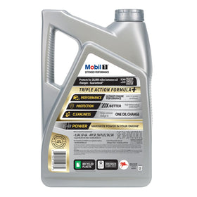 Mobil 1 being poured into an engine bay illustrating easy application and fit