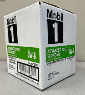 Mobil 1 beside a hybrid vehicle on road highlighting fuel-efficiency benefits