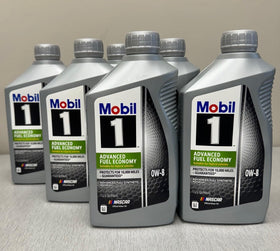 Mobil 1 being poured into an engine bay showing fast cold-start protection