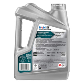 Mobil 1 being poured from container illustrating controlled pour and clean refill