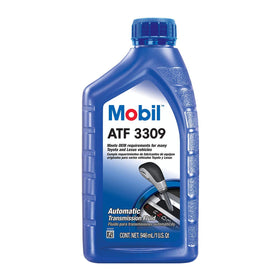 Mobil 3309 pouring into a transmission pan illustrating smooth refilling and proper lubrication
