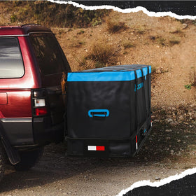 Mockins in truck bed with camping gear showing organized extra capacity benefit