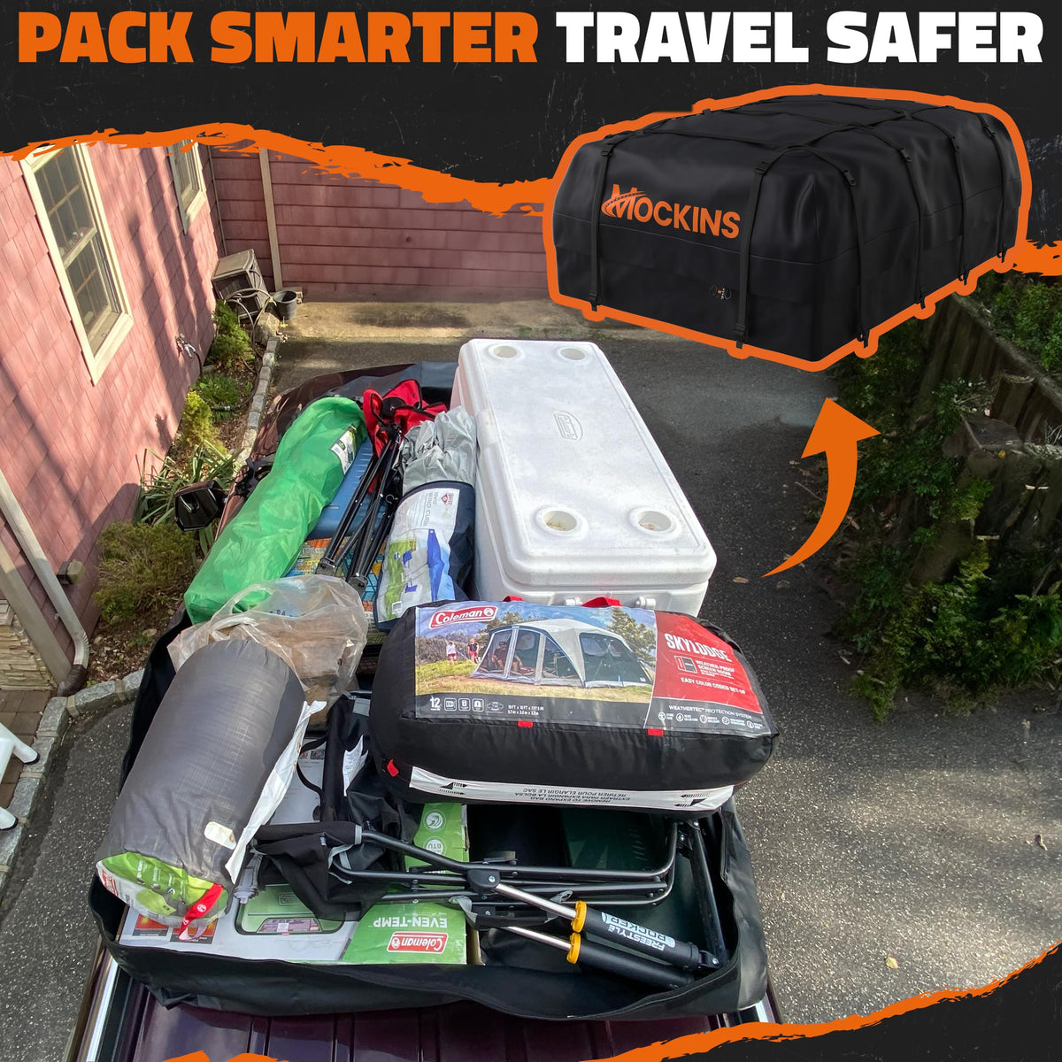 Mockins rooftop bag open and packed with suitcases for organized travel