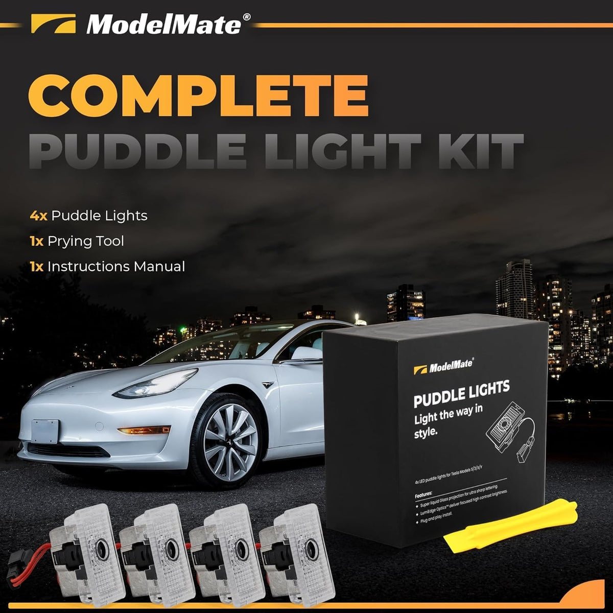 ModelMate ground projection at night showing clear Tesla logo visibility