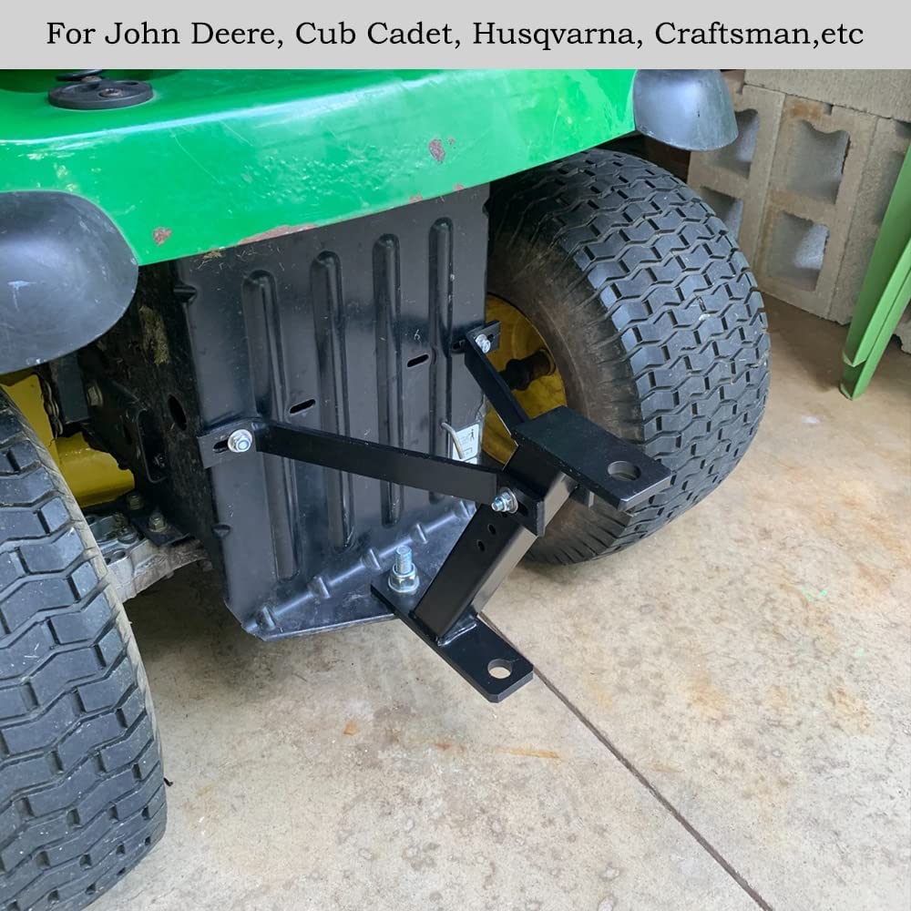 MOEUFFIR mounted on riding mower demonstrating towing function and stability