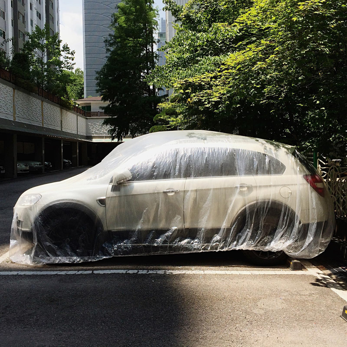 Molain car in use outdoors in rain, demonstrates immediate weather protection