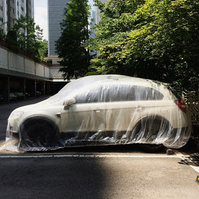 Molain car in use outdoors in rain, demonstrates immediate weather protection