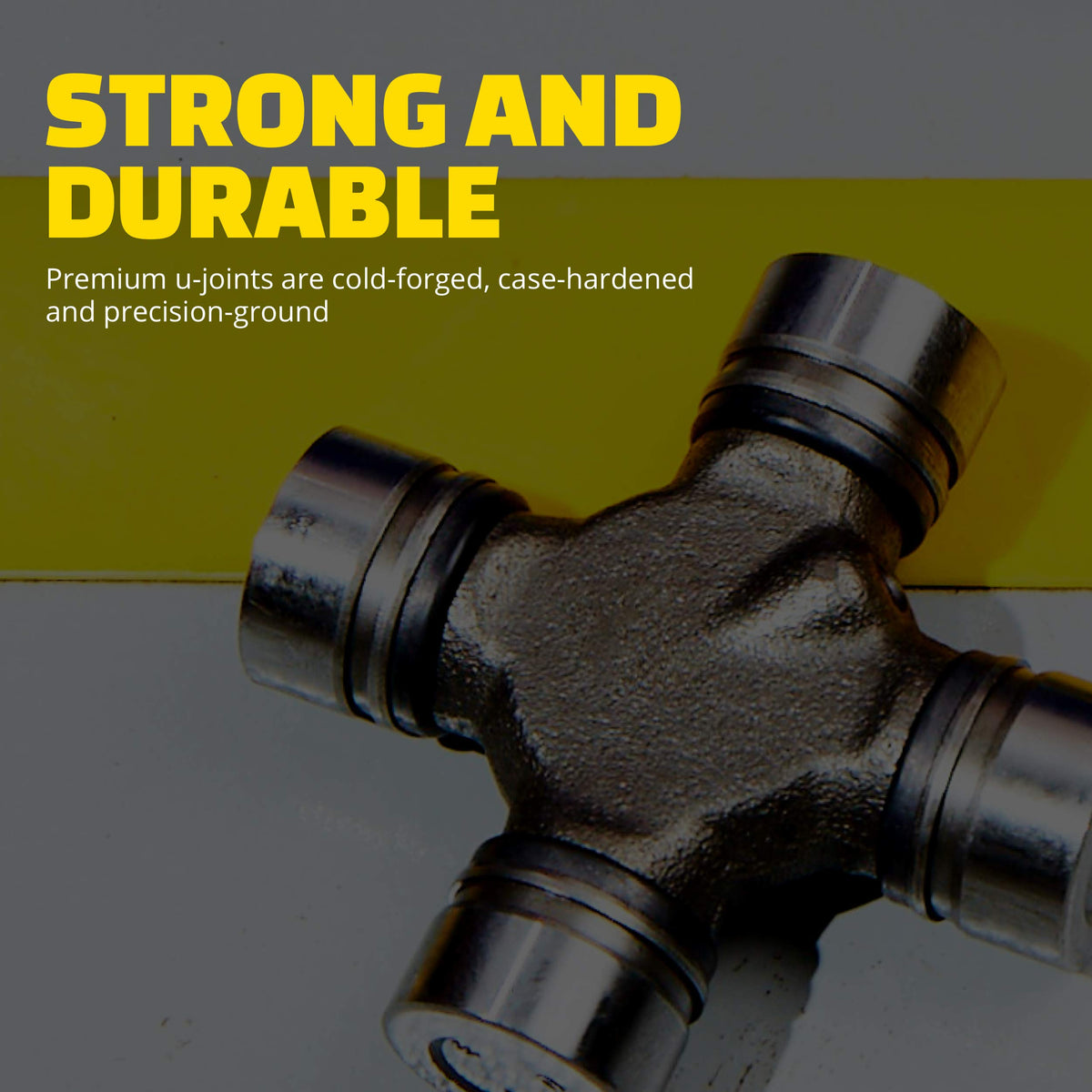MOOG 447 steel cross with grease zerk showing serviceability benefit