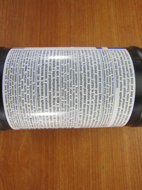 Mopar 2-quart bottle next to measuring tape showing compact size and correct service quantity