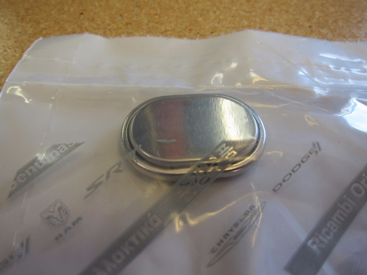 Mopar battery next to ruler showing scale for proper replacement fit