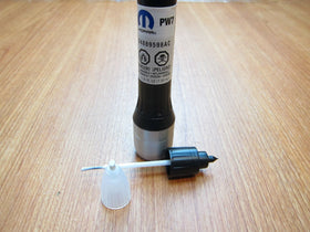 Mopar PW7 paint pen tip close-up for precision application and reduced overpaint