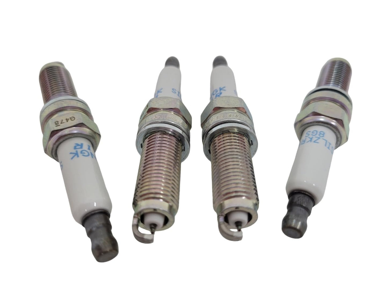 MOROTUS spark plug installed in engine socket showing correct fit benefit