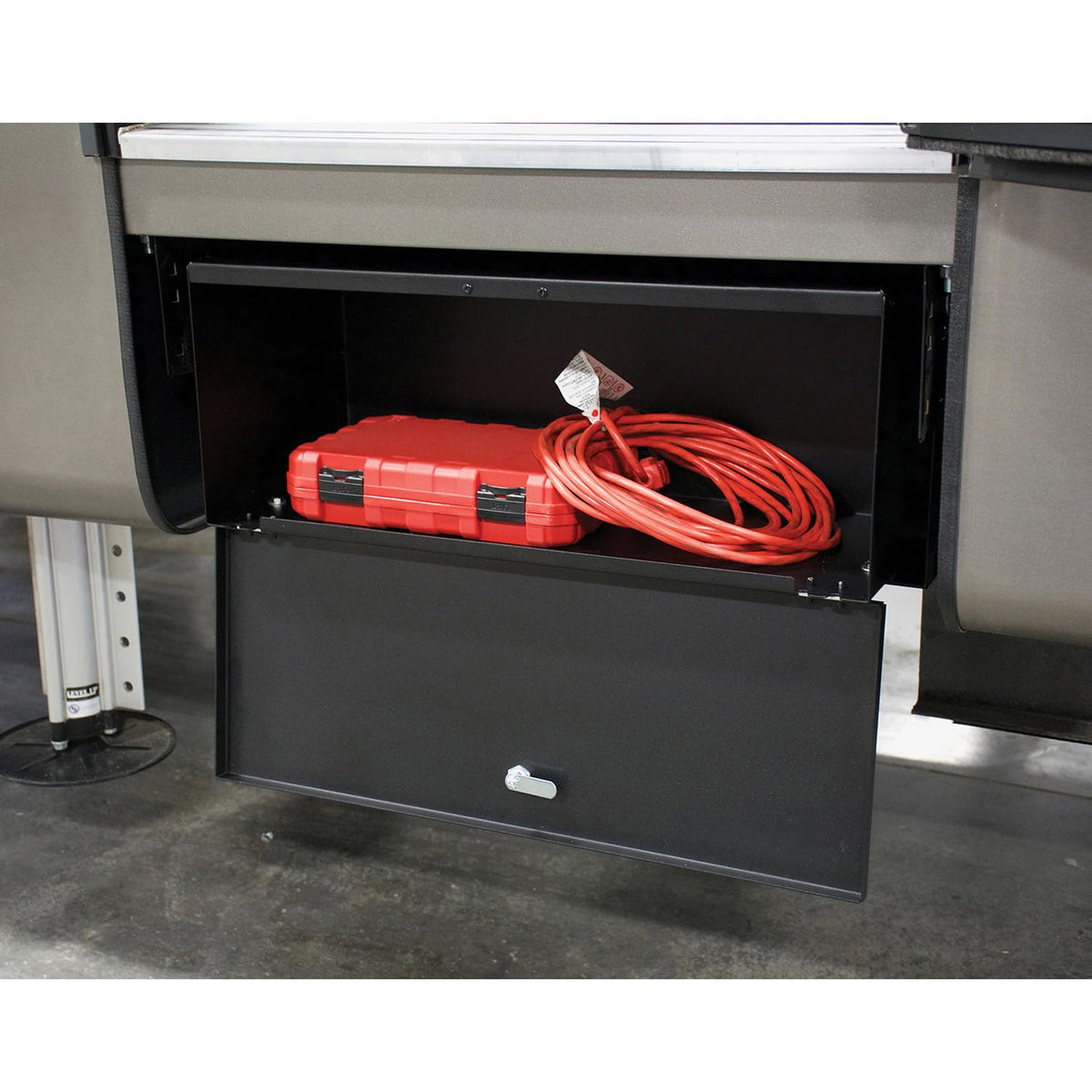 MORryde storage box installed under step demonstrating added organized storage