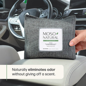 Close-up of moso bamboo charcoal granules inside bag showing porous texture and odor capture