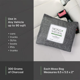 Moso Natural bag hanging from car headrest improving cabin odor control