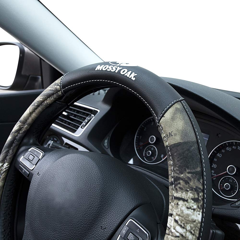 Mossy Oak installed on SUV steering wheel in cabin showing style and improved grip benefit