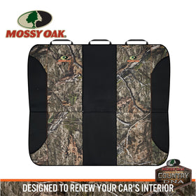 Mossy Oak camo bench in outdoor vehicle showcasing rugged lifestyle appeal