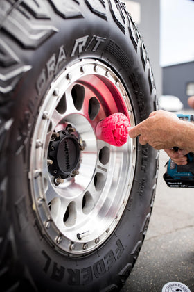 Garage scene with Mothers PowerCone 360 in use, illustrating practical detailing workflow