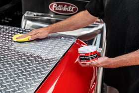 Mothers polished exhaust tip in lifestyle shot enhancing vehicle appearance