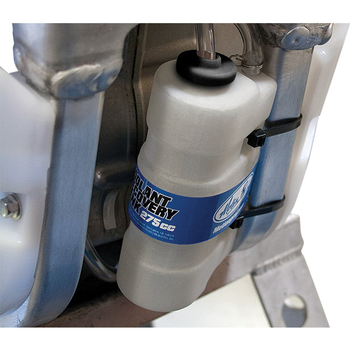 Motion Pro recovery tank installed under seat with hose and clamps, demonstrating secure fit and space saving