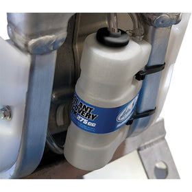 Motion Pro recovery tank installed under seat with hose and clamps, demonstrating secure fit and space saving
