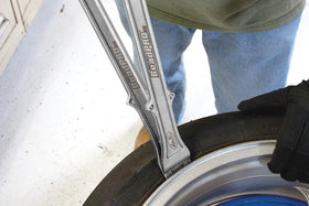 Motion Pro close-up of forged steel head highlighting strength and wear resistance