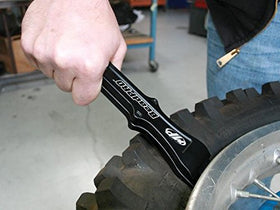 Motion Pro BeadPro in use on motorcycle tire demonstrating leverage and quick roadside repair