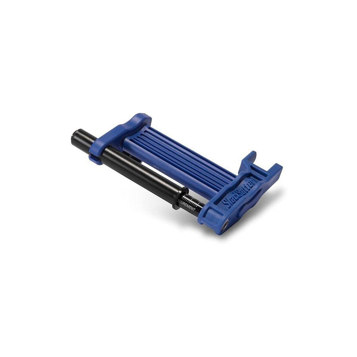 Motion Pro SlackSetter Pro front view showing compact device and accurate slack setup