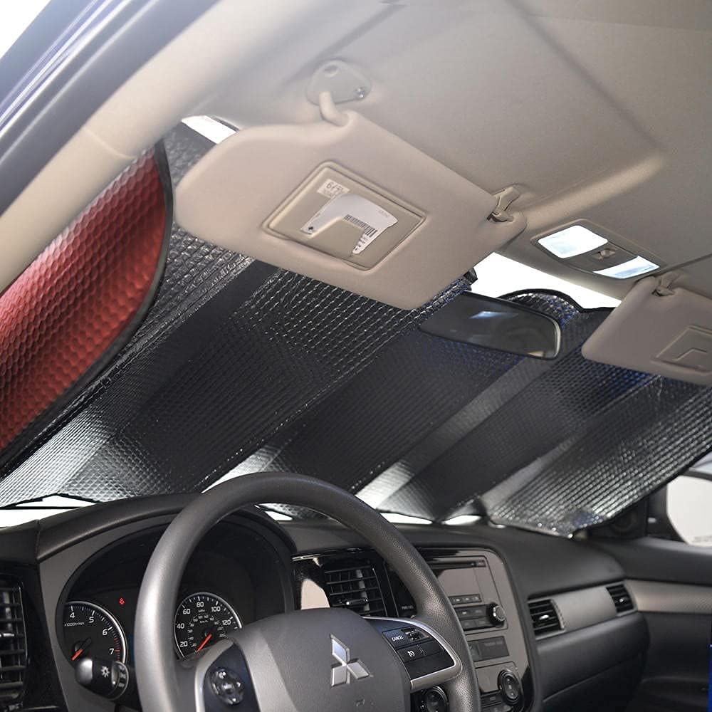 Motor Trend lifestyle scene of parked car with shade lowering heat