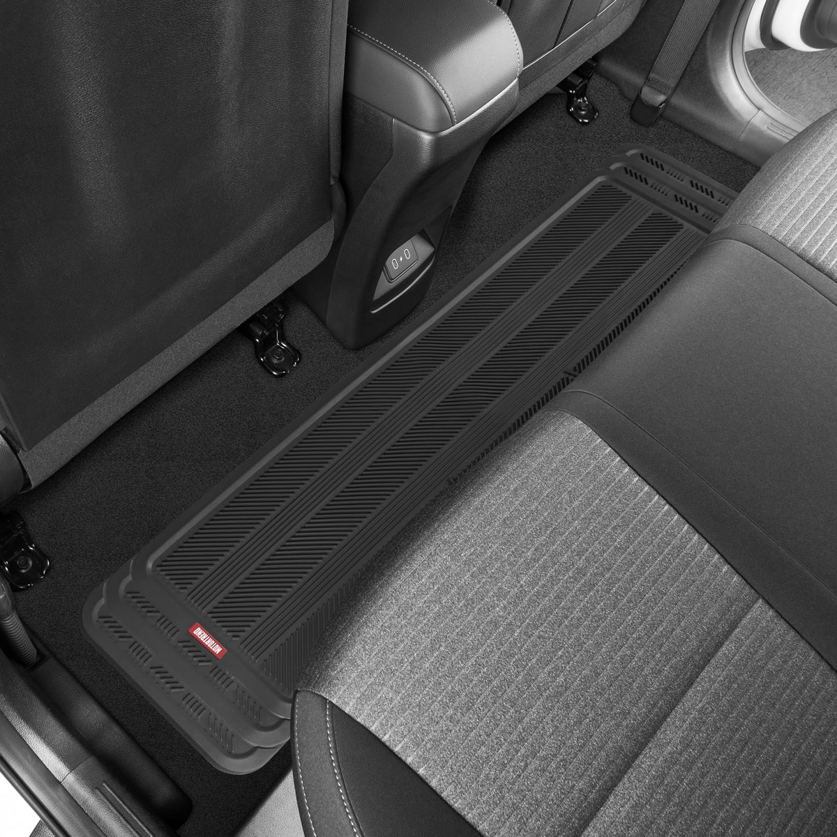 Motor Trend runner beside tape measure demonstrating trimmable size