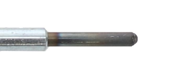 Motorcraft glow plugs beside a ruler to illustrate length and thread size for accurate replacement selection