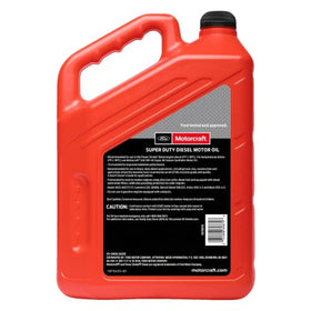 Motorcraft oil container beside measuring tape for size comparison and quick volume reference