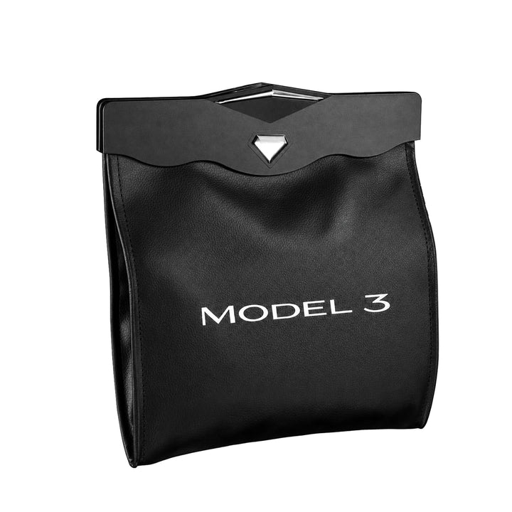 Motrobe front view clipped to Model 3 seatback shows tidy disposal benefit