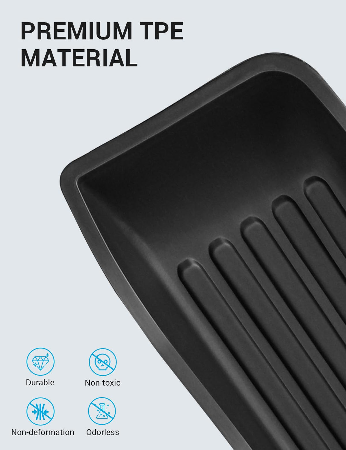 Motrobe tray beside phone and wallet to show compact size and practical capacity