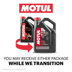 Motul 710 2T oil pouring closeup highlighting clear texture and clean burn