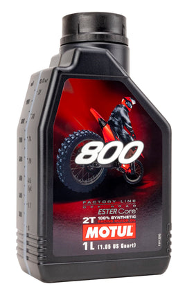 Motul 800-2T mixing premix in fuel container demonstrating easy accurate blending