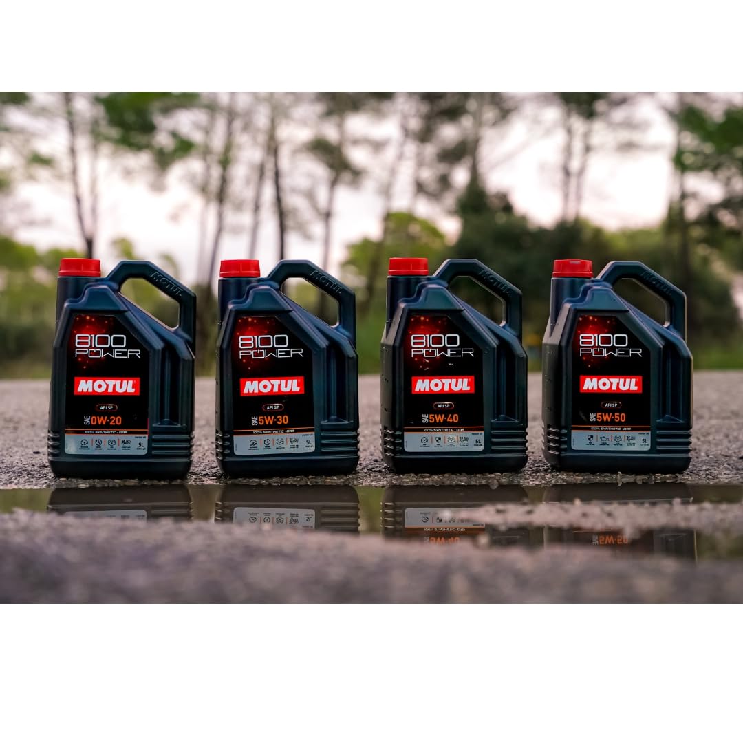 Motul 8100 Power 5L next to a ruler showing size and refill readiness