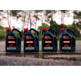 Motul 8100 Power 5L next to a ruler showing size and refill readiness