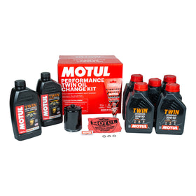 Motul engine oil 20W50 bottles clearly labeled for engine protection benefit