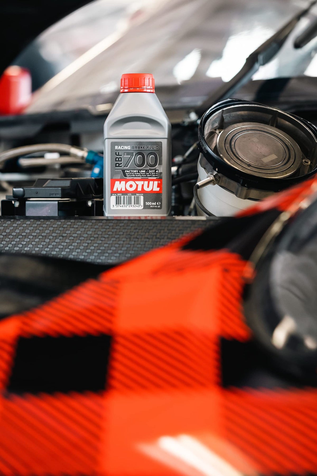 Motul RBF 700 label close-up highlighting specs and high boiling point benefit
