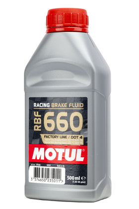 Motul RBF 660 beside a ruler for scale showing 500ml size and convenient workshop storage