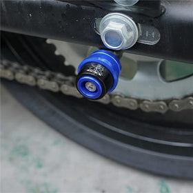 MOWOK spools used with a paddock stand in a garage for safer maintenance