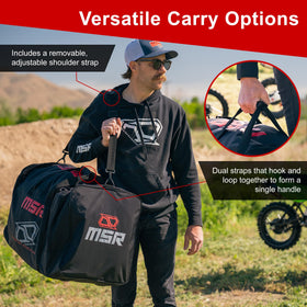 MSR gear bag side pocket with boots and gloves for organized storage