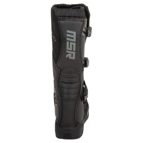 MSR M3X worn by rider on dirt track showing real-world protection and grip