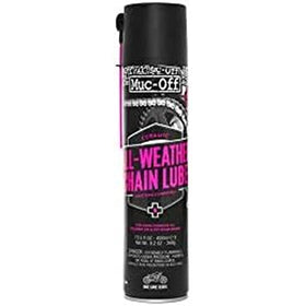 Muc-Off chain cleaner in use on a motorcycle chain removing grime