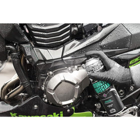 Muc-Off protectant being applied to plastic trim to restore shine