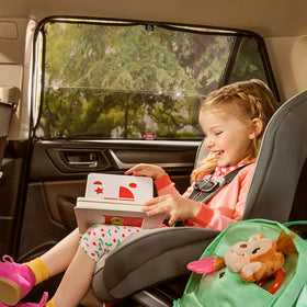 Munchkin Brica stretched across full side window for sun protection