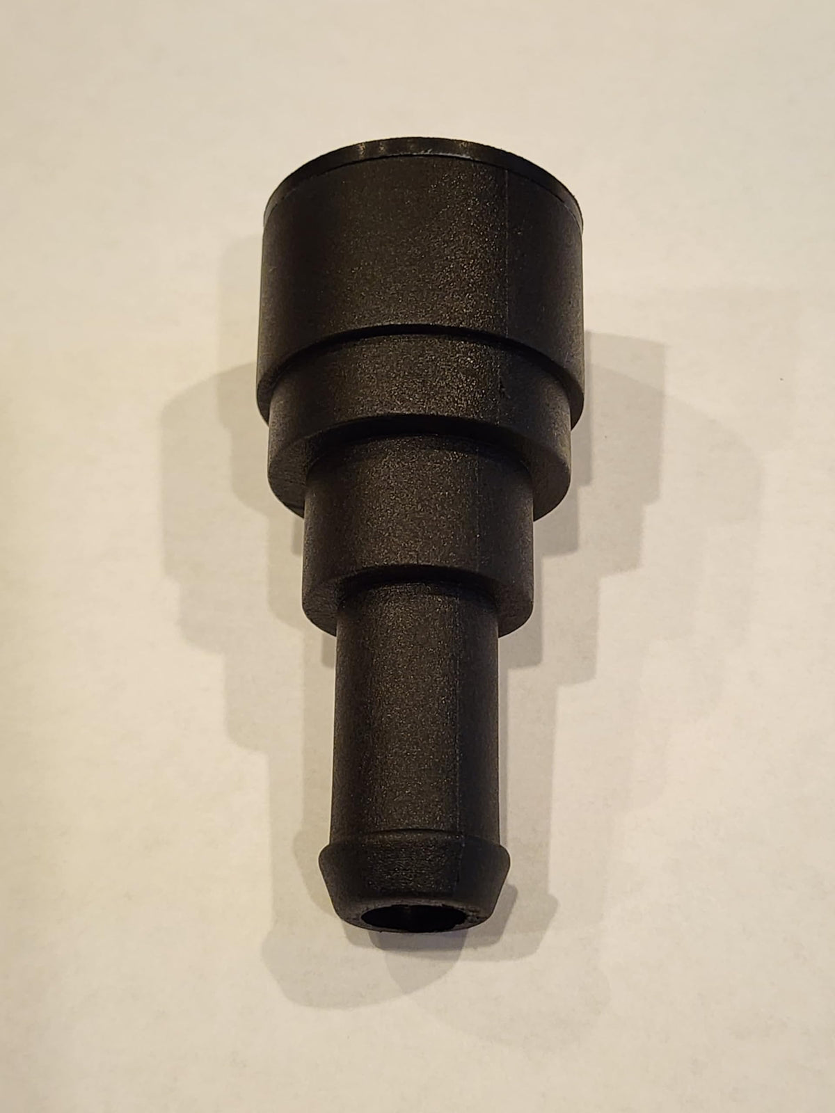 Muzzys connector installed on heater core firewall tube demonstrating secure fit and leak prevention